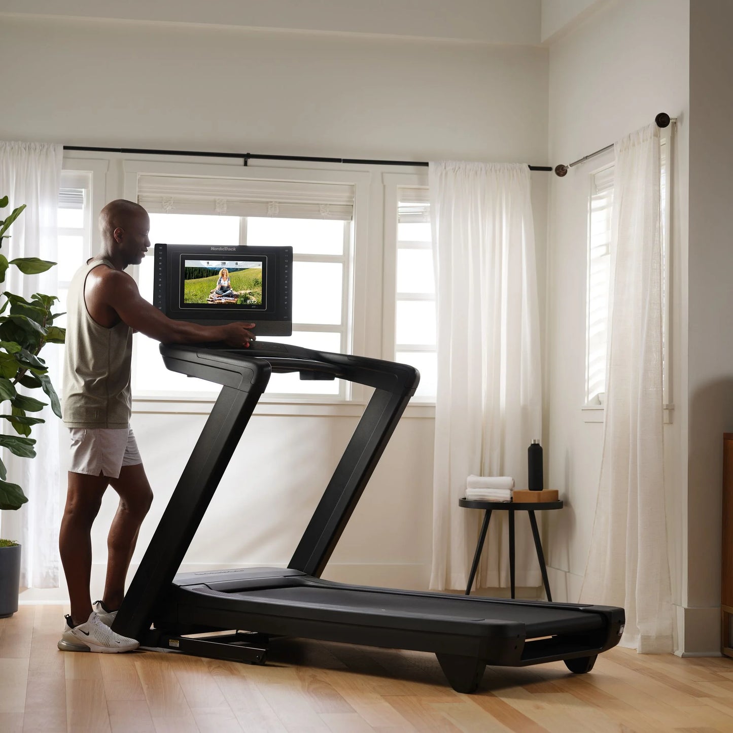 Commercial Series 1750; Ifit-Enabled Treadmill for Running and Walking with 14 Inch Pivoting Touchscreen